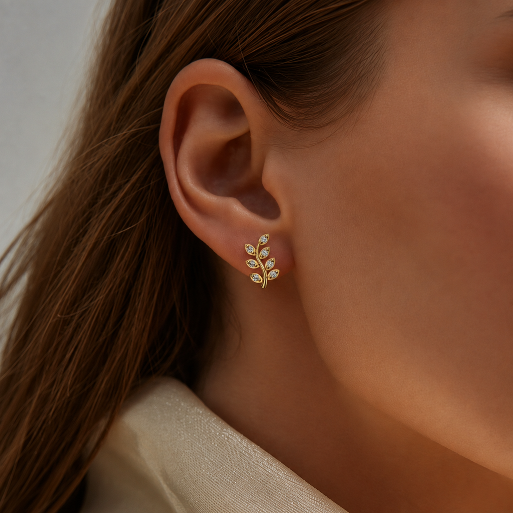 Diamond Leaf Branch Ear Climber worn on ear - close-up
