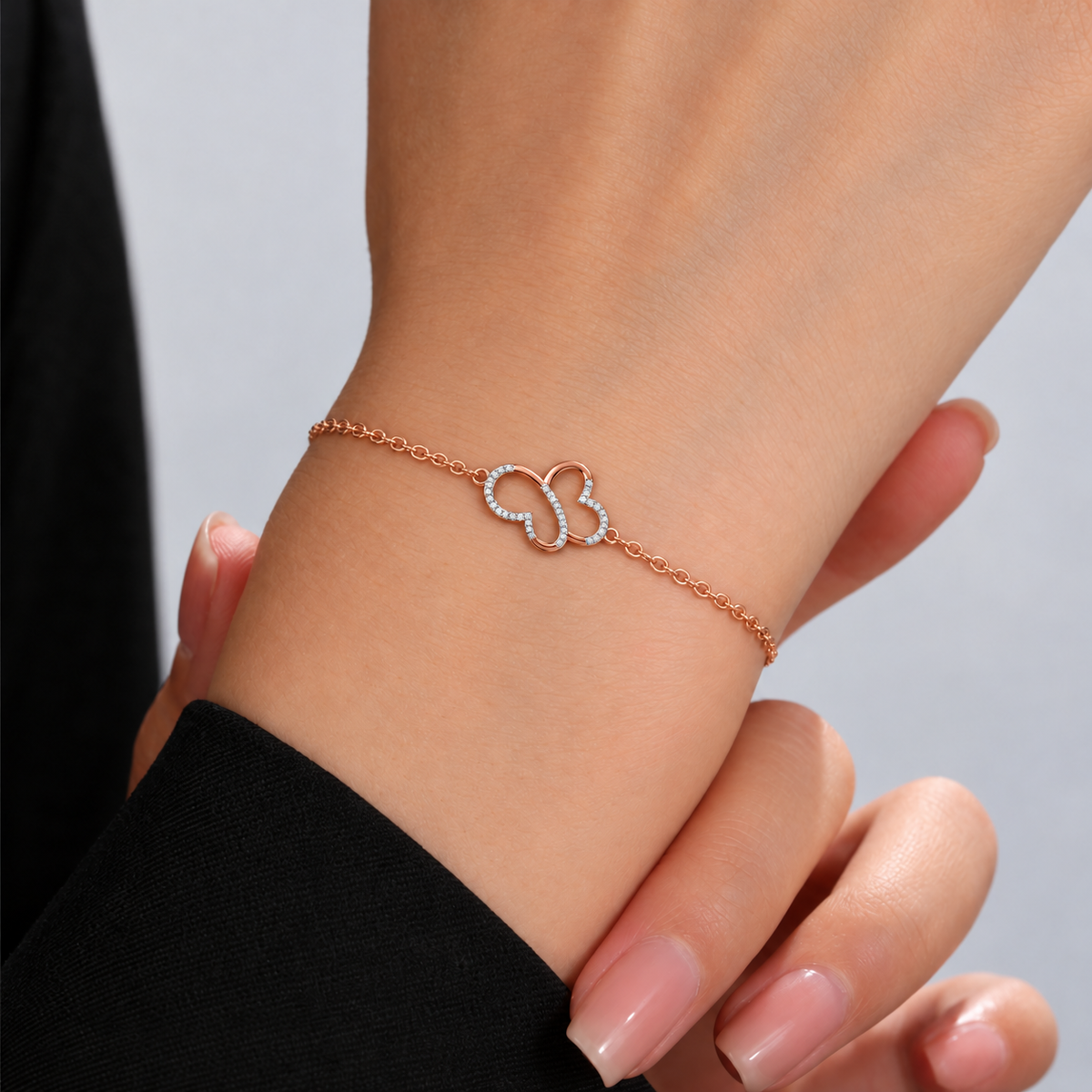 Interlocking Hearts Diamond Bracelet - worn view 1